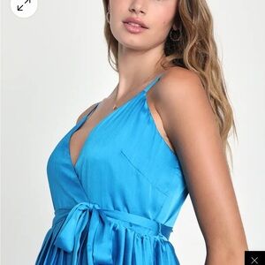 Bright blue tiered pleated midi dress from Lulus